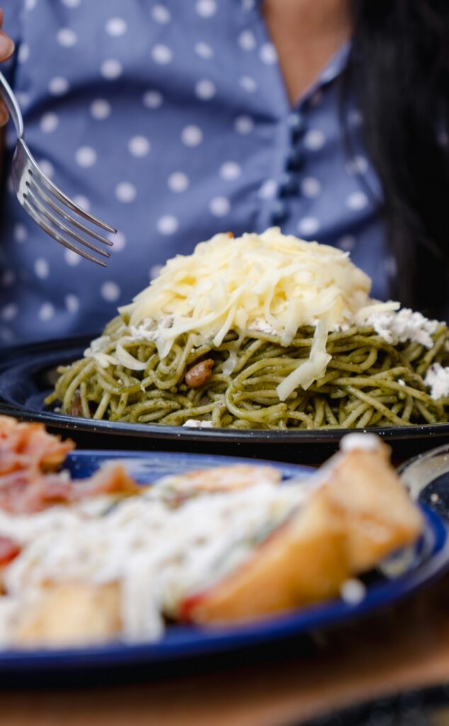 Close-up of a cheese-topped spaghetti meal in Xalapa, Mexico, perfect for a hearty lunch.